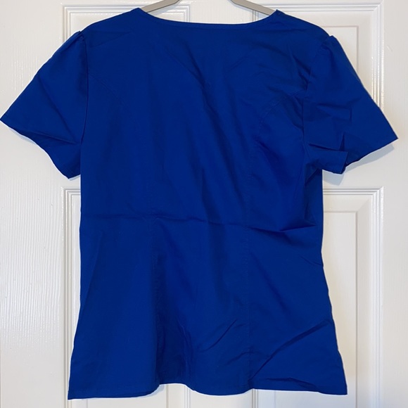 Jaanuu Royal Blue Faux Wrap 2 Pocket Scrub Top - Picture 2 of 4